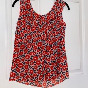 CAbi floral sleeveless blouse. New never worn S